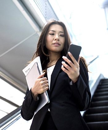 businesswoman checking her smartphone